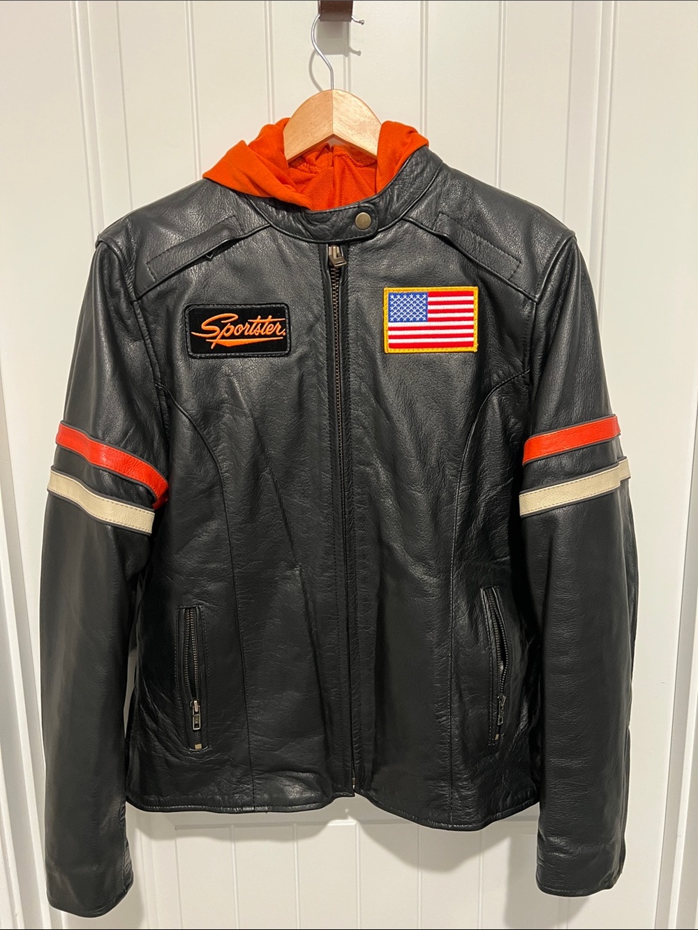 Black Leather Jacket w/ Orange Hood & Stripes and Harley patches. Women’s Large